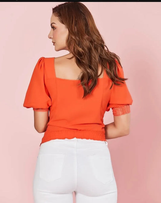 Blusa anaranjada manga abultada